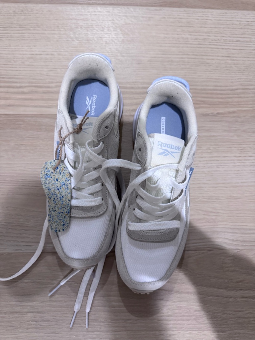 Reebok White Sneakers with Light Blue Insole Accents